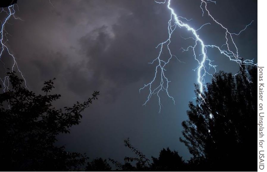 A lightning strike during a storm.
